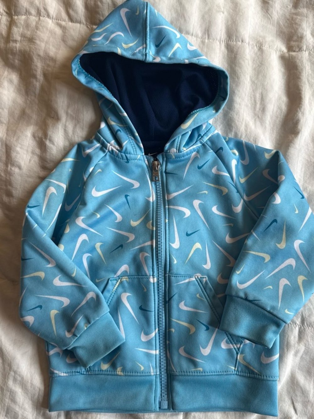 Nike Light Blue Kids Zip Hoodie with White & Yellow Swoosh Pattern